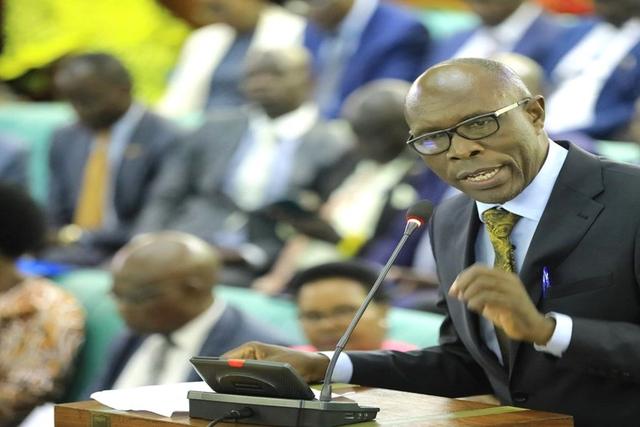 Dr. Jospeh Ruyonga, the Chairperson of the Committee on Health, presenting his statement on the forced HIV-AIDS testing