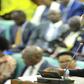 Dr. Jospeh Ruyonga, the Chairperson of the Committee on Health, presenting his statement on the forced HIV-AIDS testing