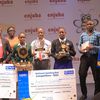 Amollo Jonathan (c) was crowned winner of the 13th annual Enjuba National Spelling Bee