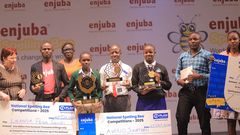 Amollo Jonathan (c) was crowned winner of the 13th annual Enjuba National Spelling Bee