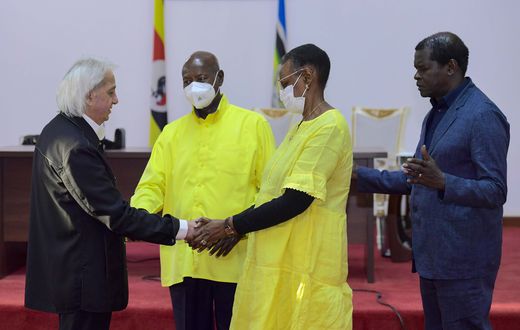 Pastor Benny Hinn prays for President Museveni and his wife Janet