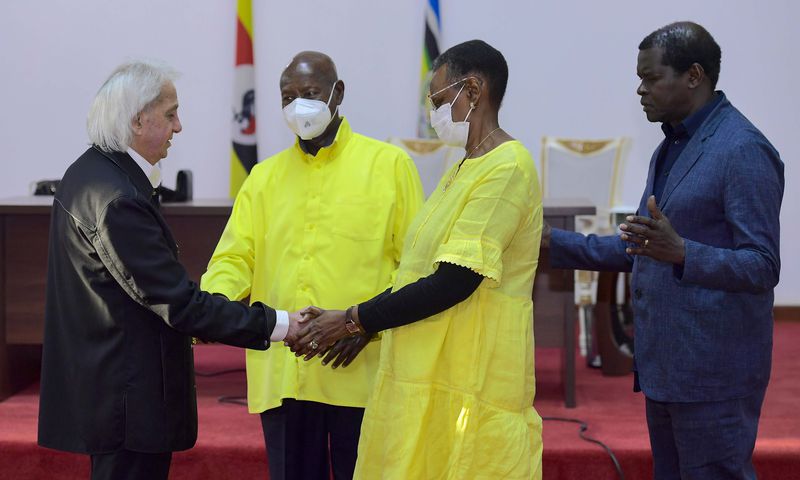 Pastor Benny Hinn prays for President Museveni and his wife Janet