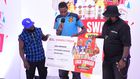 Shafiq Kyewalabye gets a check from Madrat and Chiko