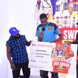Shafiq Kyewalabye gets a check from Madrat and Chiko