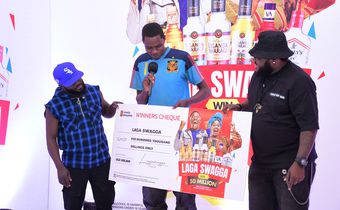 Shafiq Kyewalabye gets a check from Madrat and Chiko