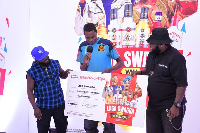 Shafiq Kyewalabye gets a check from Madrat and Chiko