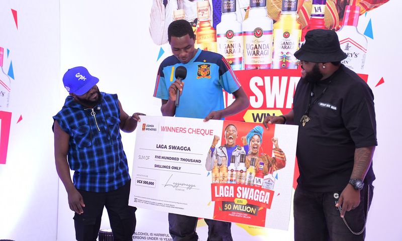 Shafiq Kyewalabye gets a check from Madrat and Chiko