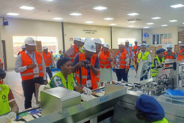 MPs touring a production line at the East African Medical Vitals