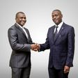 Daniel Ligyalingi, outgoing board chairman (L) and Joseph Lubaale Bagabo the new board chairman (R)