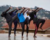 The dance theatre features a diverse cast of five dancers, each bringing their own ethnic backgrounds, skin tones, and body types to the stage.
