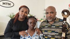 Pastor Martin Ssempa and one his grand children paid a visit to MTN CEO Sylivia Mulinge