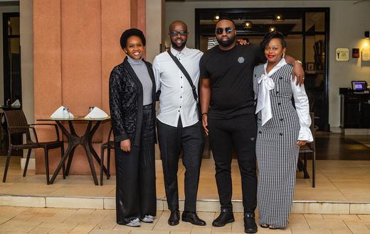 Eddy Kenzo and Minister Nyamutoro pose with Rema Namakula, her husband Dr Hamza Ssebunnya