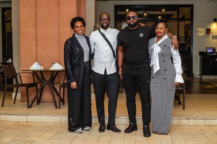 Eddy Kenzo and Minister Nyamutoro pose with Rema Namakula, her husband Dr Hamza Ssebunnya