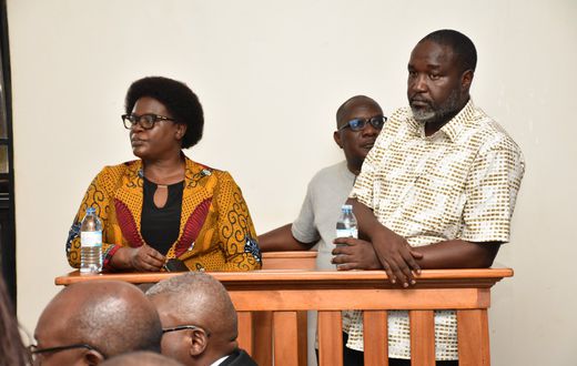 Dorothy Kisaka, David Luyimbazi and Okello in the dock at Kasangati Magistrates Court
