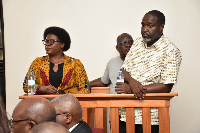 Dorothy Kisaka, David Luyimbazi and Okello in the dock at Kasangati Magistrates Court
