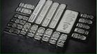 https://unsplash.com/photos/a-pile-of-silver-bars-sitting-on-top-of-a-table-p9ObWeLsCvs?utm_content=creditShareLink&utm_medium=referral&utm_source=unsplash