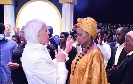 Pastor Benny Hinn prays for HRH Sylvia Nagginda Luswata