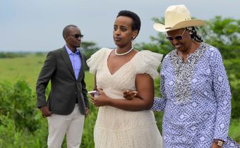 Natasha Museveni holding her phone