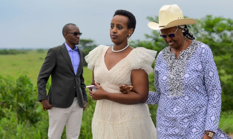 Natasha Museveni holding her phone