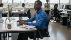 A young employee in office