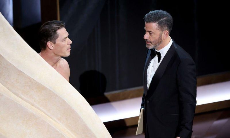 John Cena walked onstage nearly naked while introducing the nominees for best costume design.
