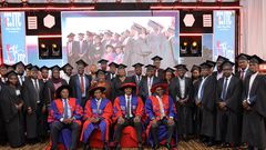 PSST Ramadhan Ggoobi and the leadership of the ITC (seated) pose with some of the graduates