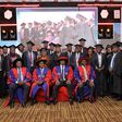 PSST Ramadhan Ggoobi and the leadership of the ITC (seated) pose with some of the graduates