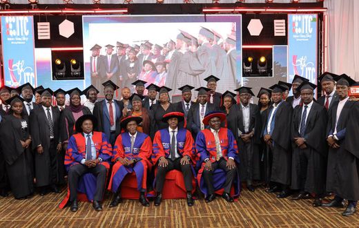 PSST Ramadhan Ggoobi and the leadership of the ITC (seated) pose with some of the graduates