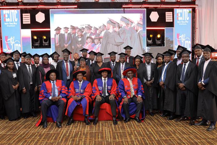 PSST Ramadhan Ggoobi and the leadership of the ITC (seated) pose with some of the graduates