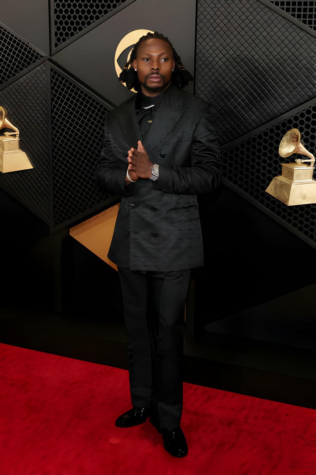 Asake attends the 66th GRAMMY Awards at Crypto.com Arena on February 04, 2024 in Los Angeles, California. (Photo by Kayla Oaddams/WireImage)