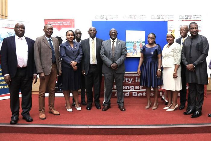 Katumba in a group photo with officials from PPDA, COST and Minitry of Finance 2