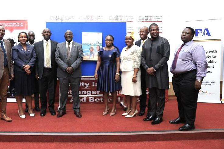 Katumba in a group photo with officials from PPDA, COST and Minitry of Finance 2