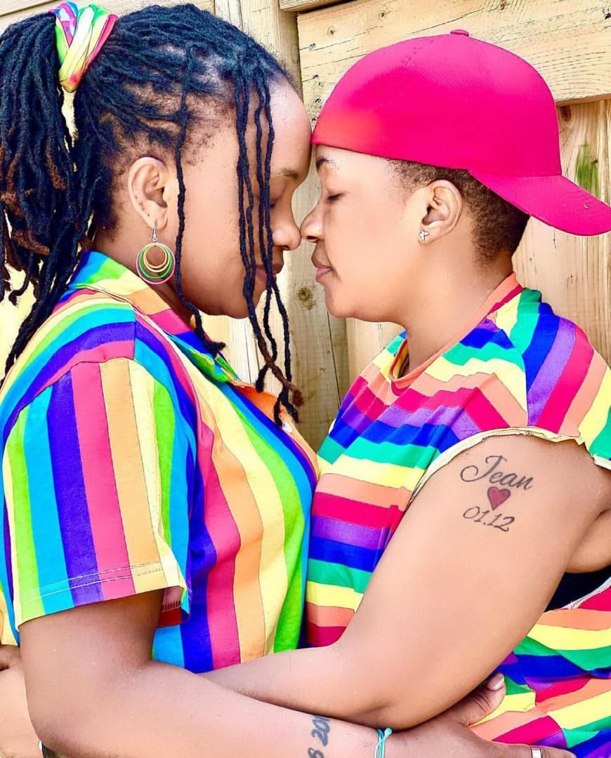 Julie Mutesasira and her partner in Canada