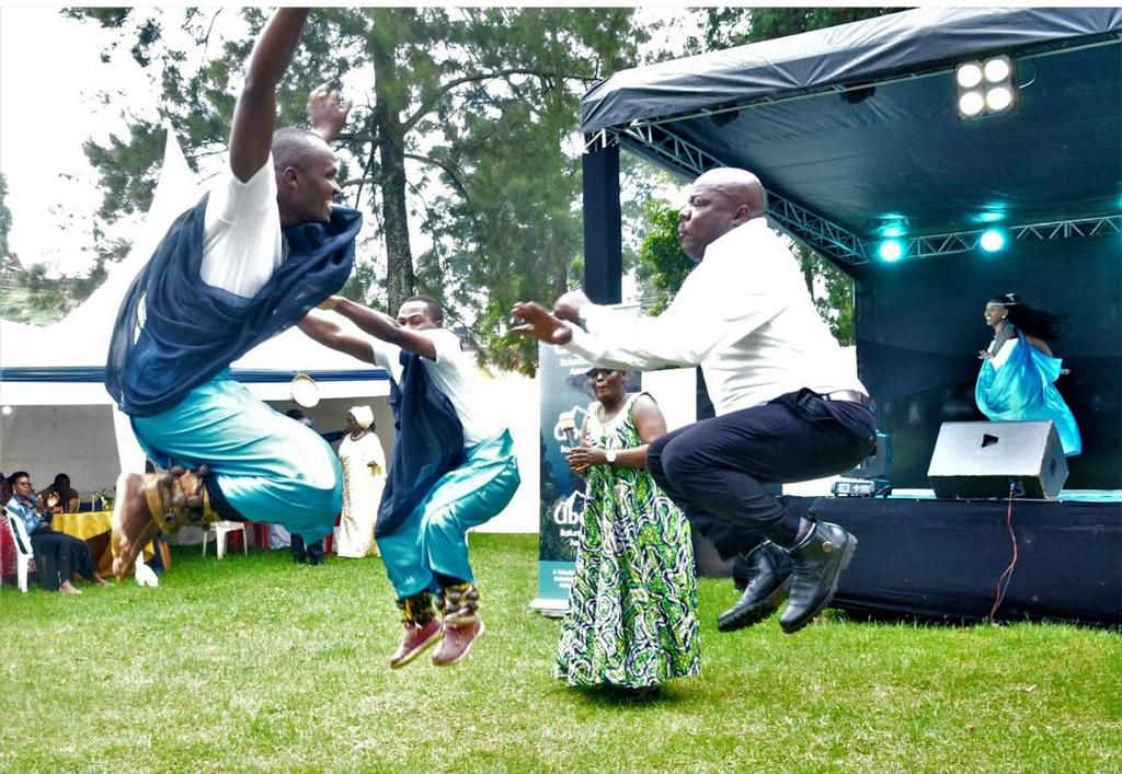 Abel Bizimana, the Kisoro district chairman joins in a traditional dance at the  2023 Isangane Festival