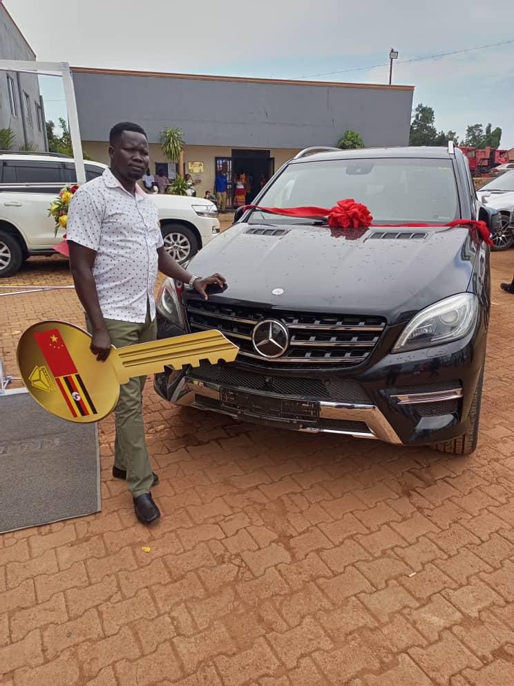 Businessman Matthew won a new Mercedes Benz at the function