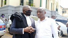 Ham-Kiggundu-with-his-lawyer-Fred-Muwema
