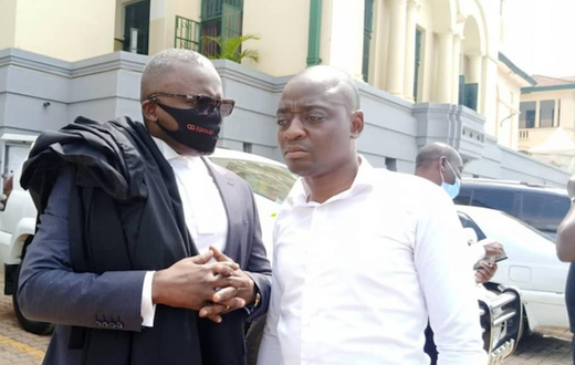 Ham-Kiggundu-with-his-lawyer-Fred-Muwema