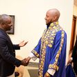 Deputy Speaker Thomas Tayebwa shakes hands with King Oyo