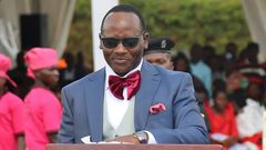Mathias Mpuuga speaking at the thanksgiving event