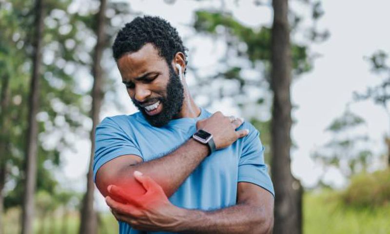 Man experiencing post work out pain