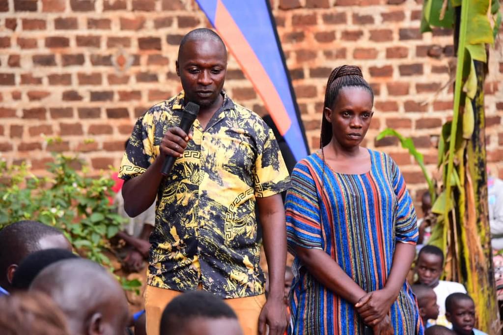 Nsubuga's parents speaking at the event
