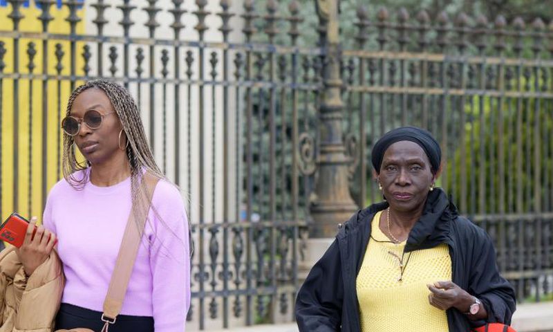 African ladies walking on the street