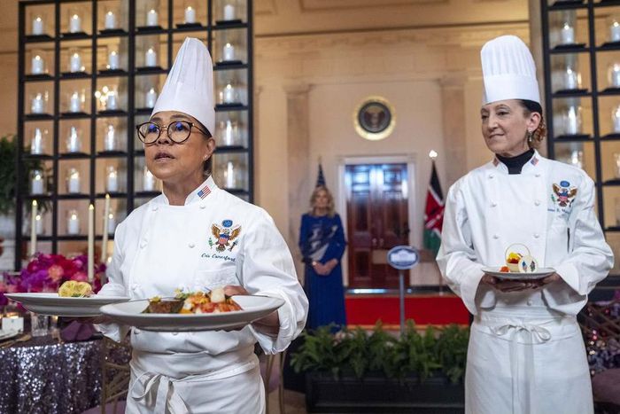 White House Executive Chef Cris Comerford holding meals to be served at President Ruto's state dinner at the White House. Photo Credit: Jacquelyn Martin/AP