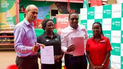 Officials from both companies at the MoU signing