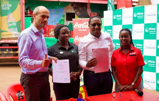 Officials from both companies at the MoU signing