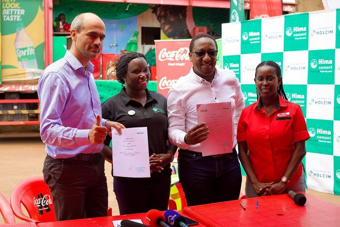 Officials from both companies at the MoU signing