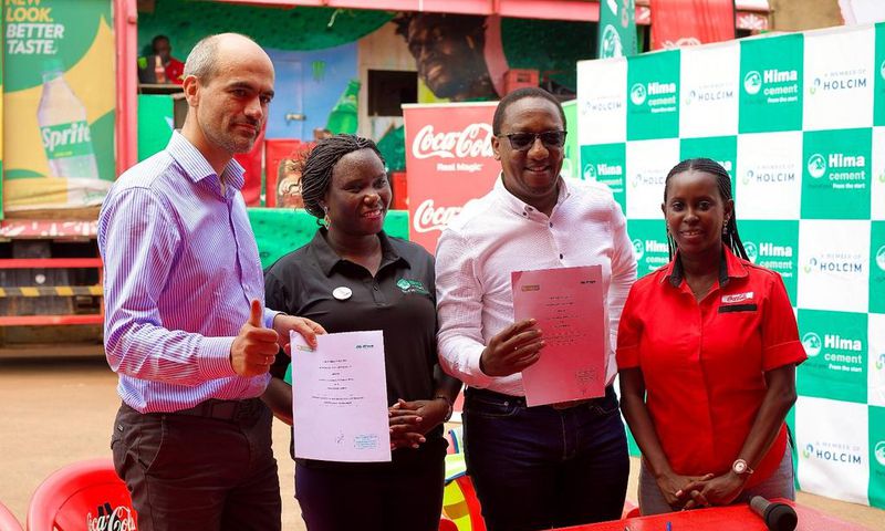 Officials from both companies at the MoU signing