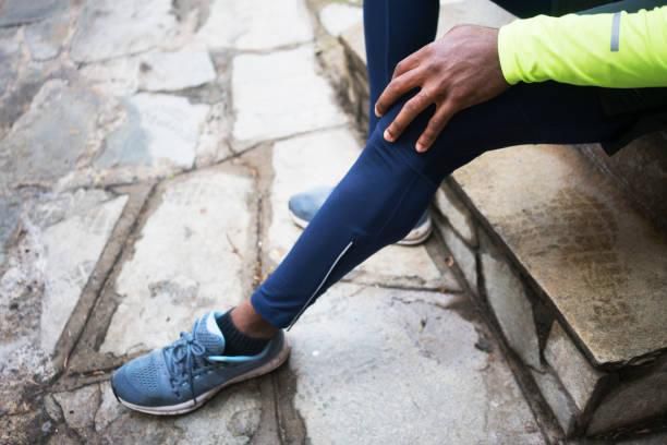 Man experiencing post work out pain