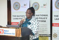 The Lands Ministry Permanent Secretary Mrs Dorcas W Okalany speaking at the policy review