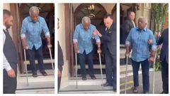 Amama Mbabazi was filmed struggling to walk in London